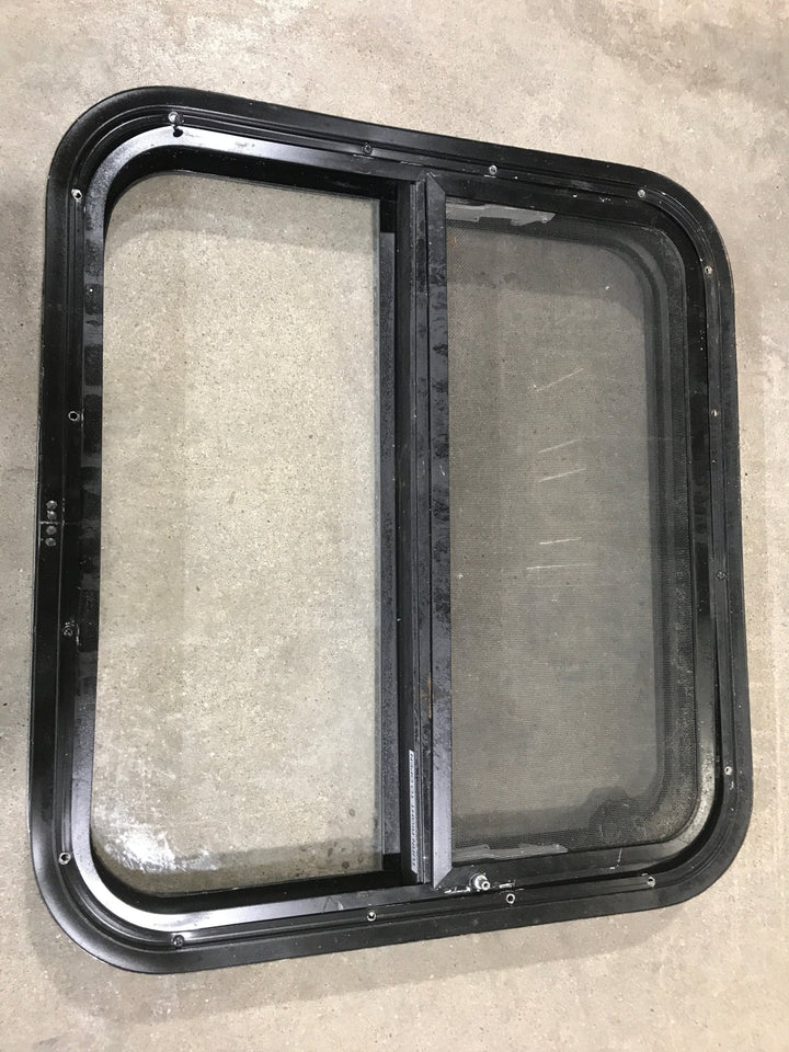 Used Black Radius Opening Window : 23 1/2" W X 21 1/4" H X 2" D - Young Farts RV Parts