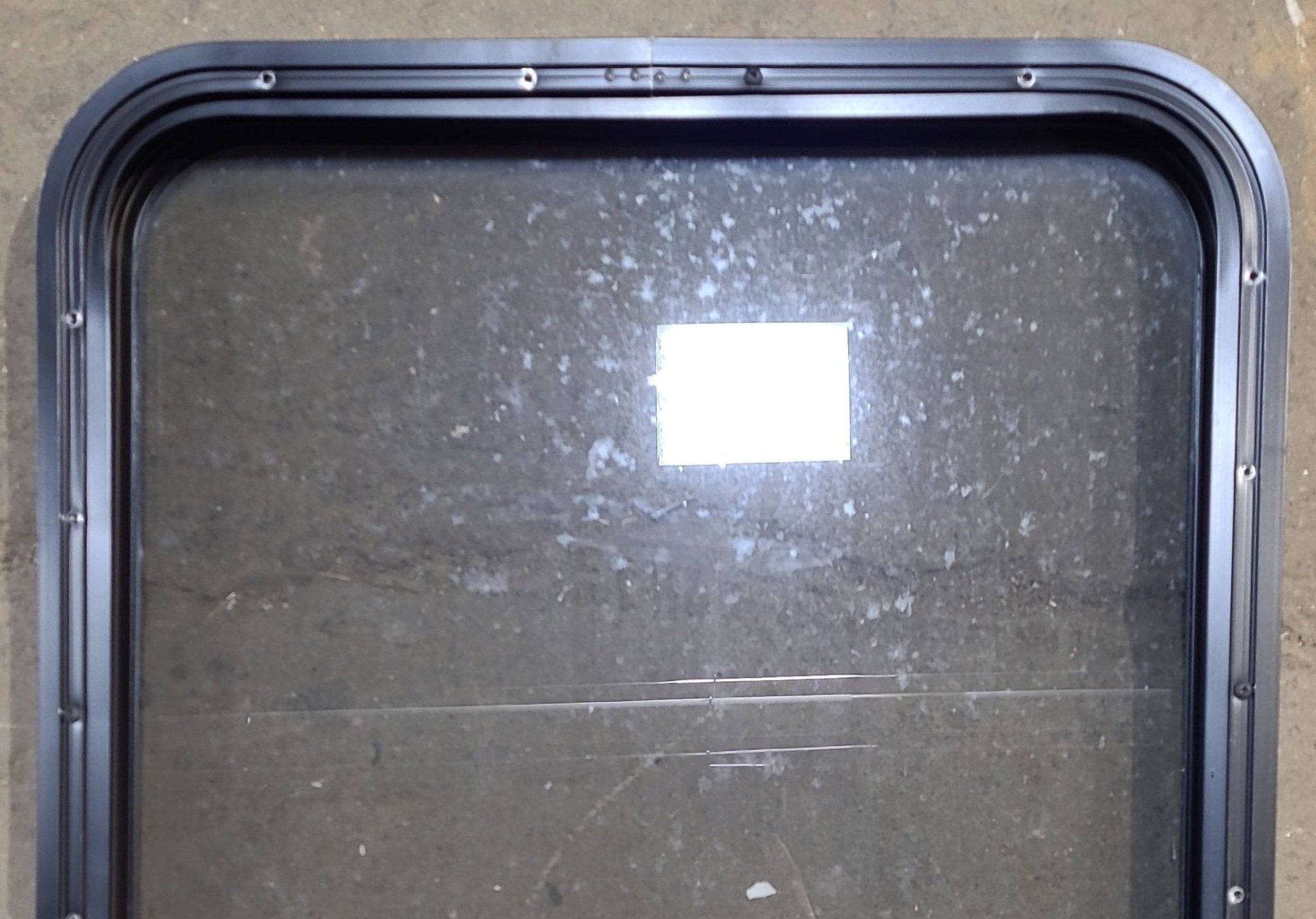 Used Black Radius Opening Window : 23 1/2" W x 28 3/4" H x 1 3/4" D - Young Farts RV Parts