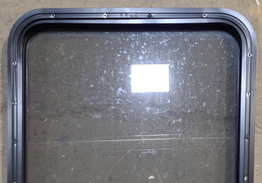 Used Black Radius Opening Window : 23 1/2" W x 28 3/4" H x 1 3/4" D - Young Farts RV Parts