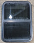 Used Black Radius Opening Window : 23 1/2" W x 33 1/4" H x 1 3/4" - Young Farts RV Parts