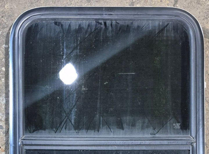 Used Black Radius Opening Window : 23 1/2" W x 33 1/4" H x 1 3/4" - Young Farts RV Parts