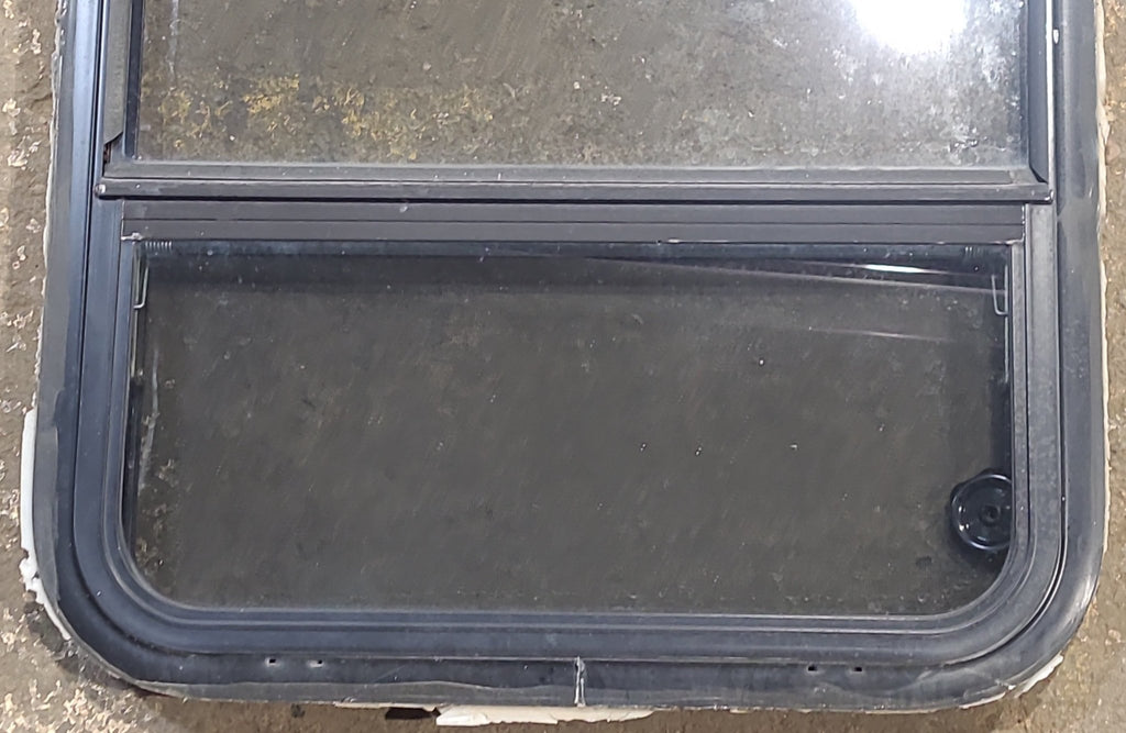 Used Black Radius Opening Window : 23 1/2" W x 34 1/2" H x 1 1/4" D - Young Farts RV Parts