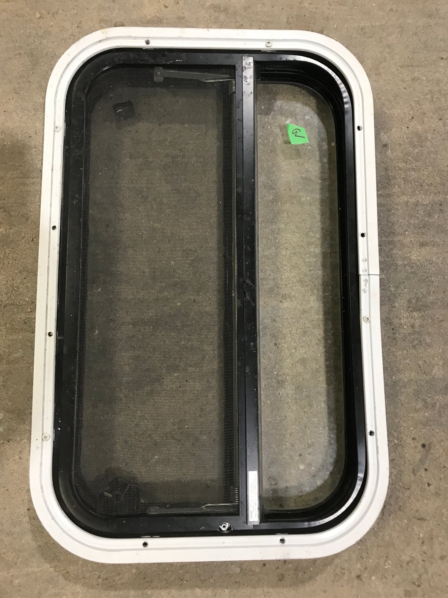 Used Black Radius Opening Window : 23 1/4" W X 14 1/2" H X 2" D - Young Farts RV Parts