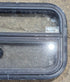 Used Black Radius Opening Window : 23 1/4" W x 14 1/4" H x 1 7/8" - Young Farts RV Parts