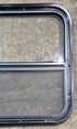 Used Black Radius Opening Window : 23 1/4" W x 21 1/4" H x 1 1/2" - Young Farts RV Parts