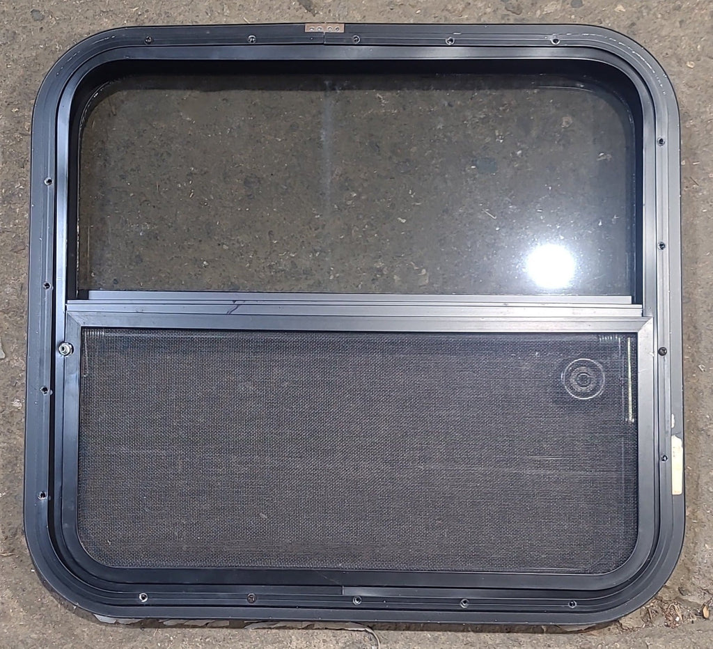 Used Black Radius Opening Window : 23 1/4" W x 21 1/4" H x 1 1/4" D - Young Farts RV Parts