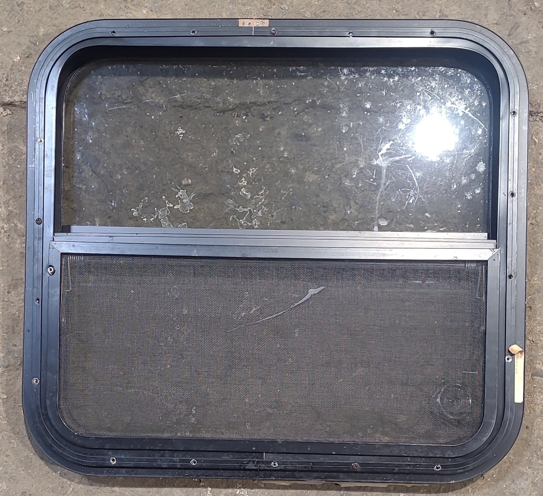 Used Black Radius Opening Window : 23 1/4" W x 21 1/4" H x 1 1/4" D - Young Farts RV Parts