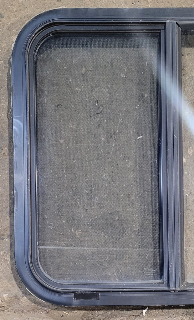 Used Black Radius Opening Window : 23 1/4" W x 21 3/4" H x 1 3/4" - Young Farts RV Parts