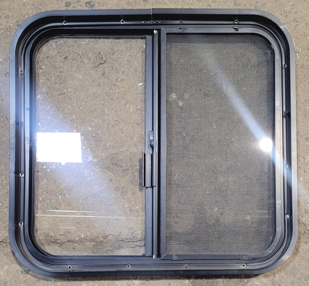 Used Black Radius Opening Window : 23 1/4" W x 21 3/4" H x 1 3/4" - Young Farts RV Parts