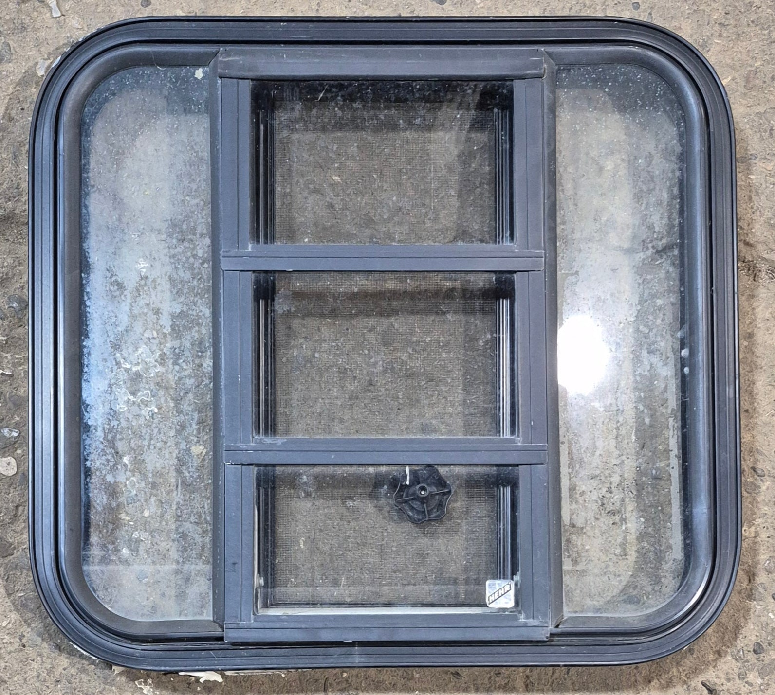 Used Black Radius Opening Window : 23 1/4" W x 21 3/4" H x 1 7/8" - Young Farts RV Parts