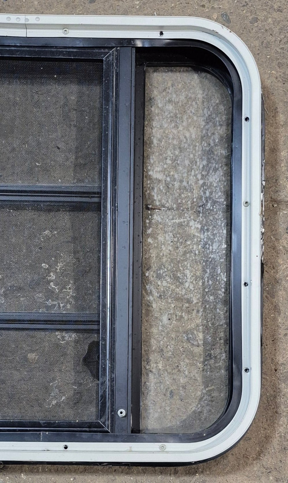 Used Black Radius Opening Window : 23 1/4" W x 21 3/4" H x 1 7/8" - Young Farts RV Parts