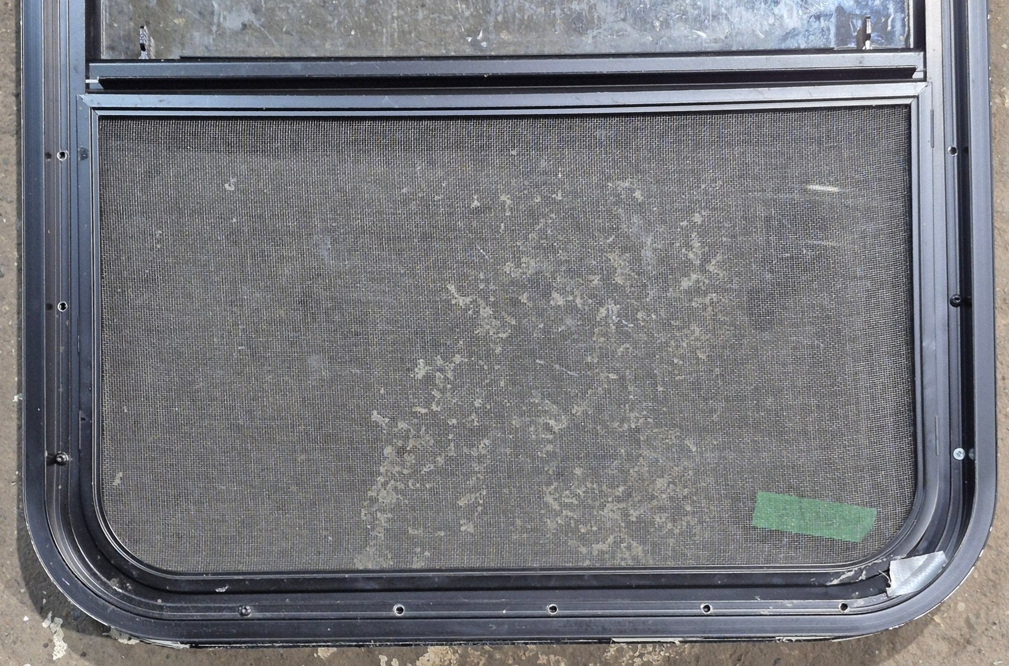 Used Black Radius Opening Window : 23 1/4" W x 28 1/4" H x 1 3/4" D - Young Farts RV Parts