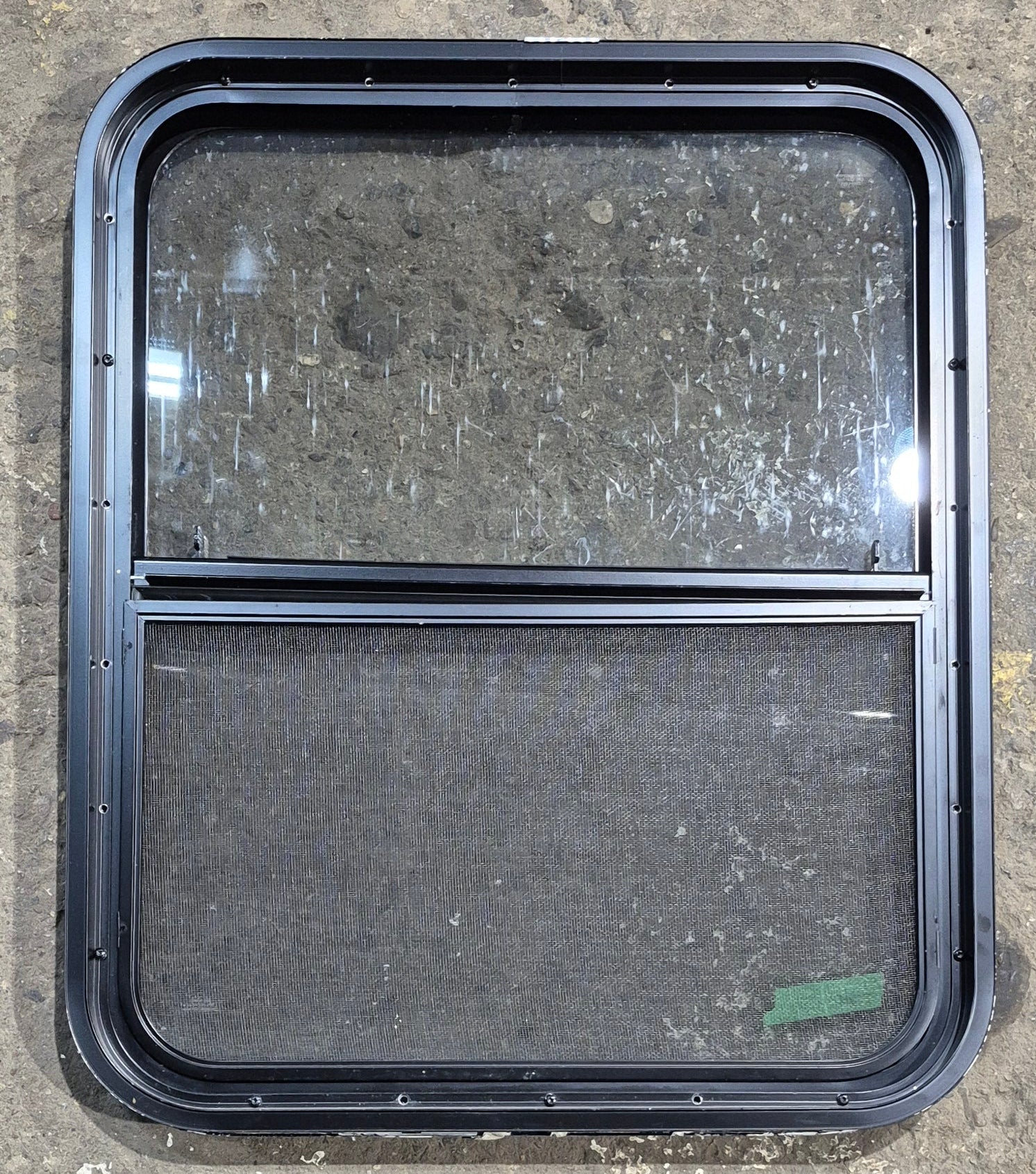 Used Black Radius Opening Window : 23 1/4" W x 28 1/4" H x 1 3/4" D - Young Farts RV Parts