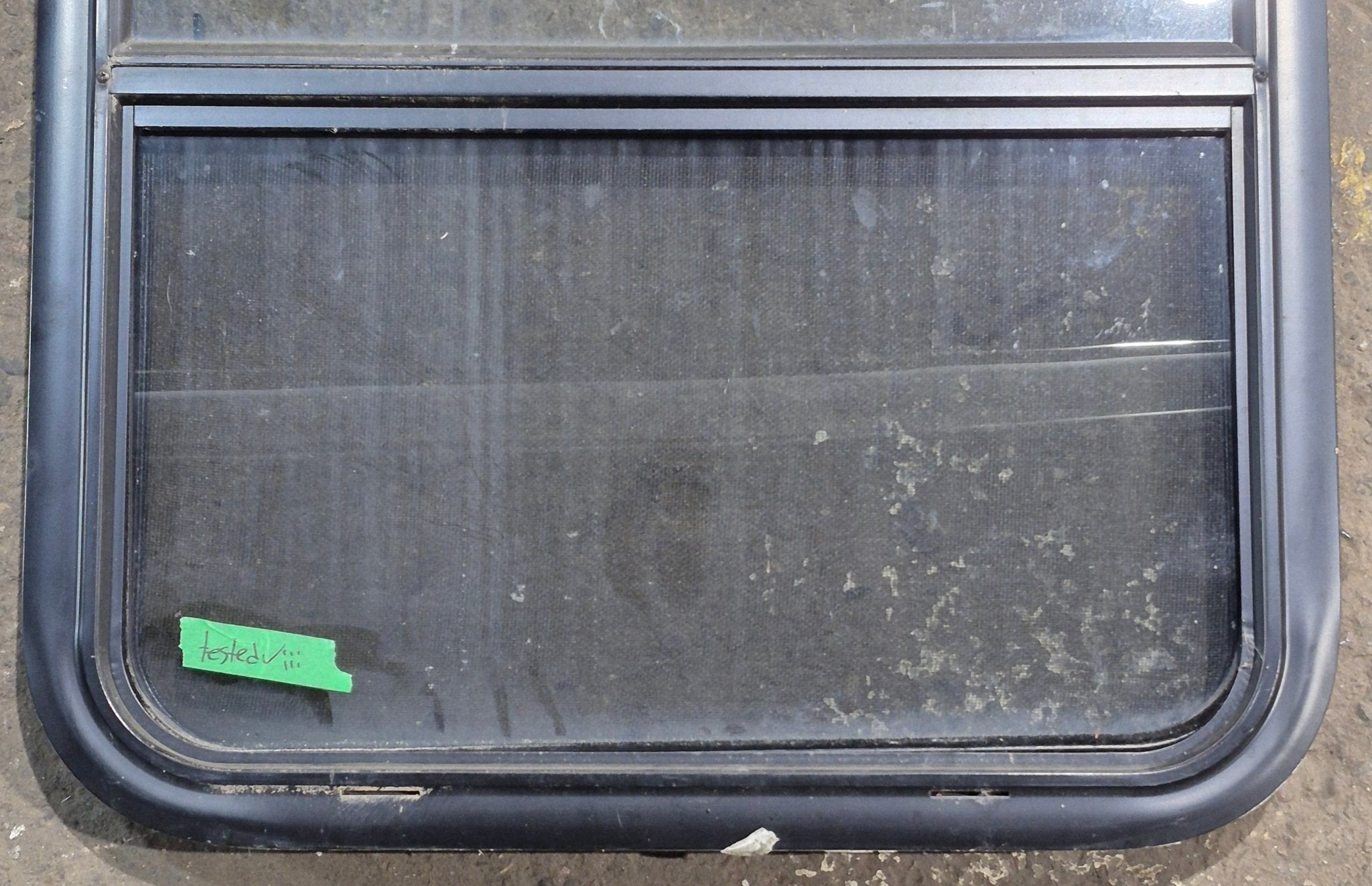 Used Black Radius Opening Window : 23 1/4" W x 28 1/4" H x 1 3/4" D - Young Farts RV Parts