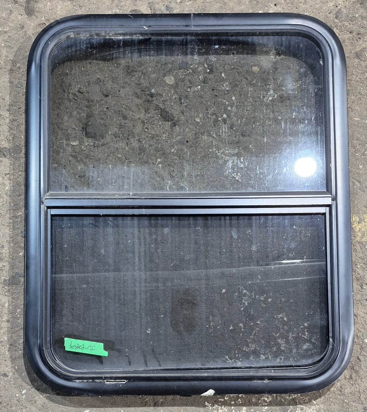Used Black Radius Opening Window : 23 1/4" W x 28 1/4" H x 1 3/4" D - Young Farts RV Parts
