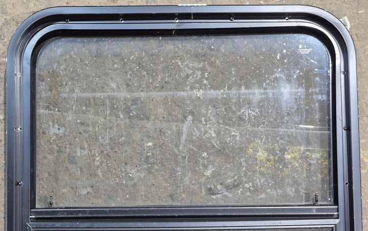 Used Black Radius Opening Window : 23 1/4" W x 28 1/4" H x 1 3/4" D - Young Farts RV Parts