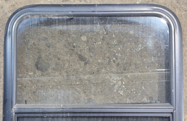 Used Black Radius Opening Window : 23 1/4" W x 28 1/4" H x 1 3/4" D - Young Farts RV Parts