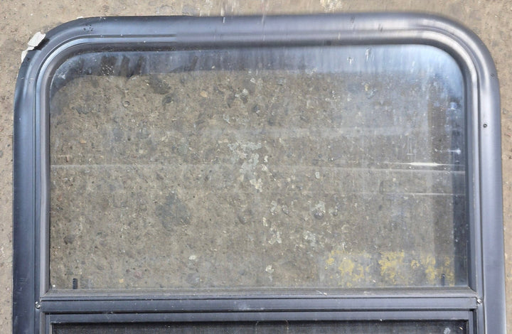 Used Black Radius Opening Window : 23 1/4" W x 28 1/4" H x 1 3/4" D - Young Farts RV Parts