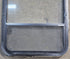 Used Black Radius Opening Window : 23 1/4" W x 34 1/2" H x 1 3/4" D - Young Farts RV Parts