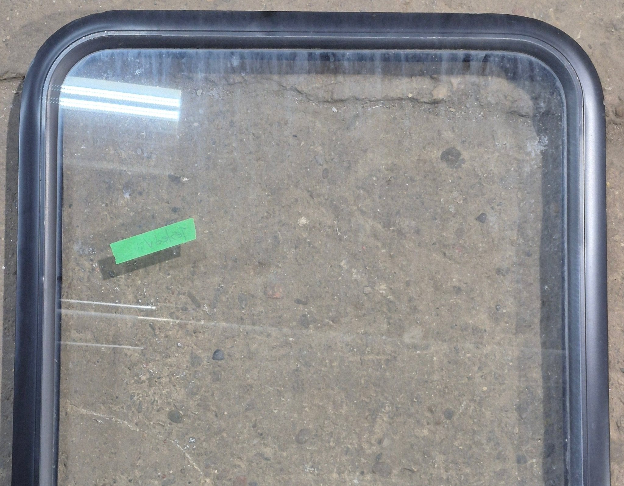 Used Black Radius Opening Window : 23 1/4" W x 34 1/2" H x 1 3/4" D - Young Farts RV Parts