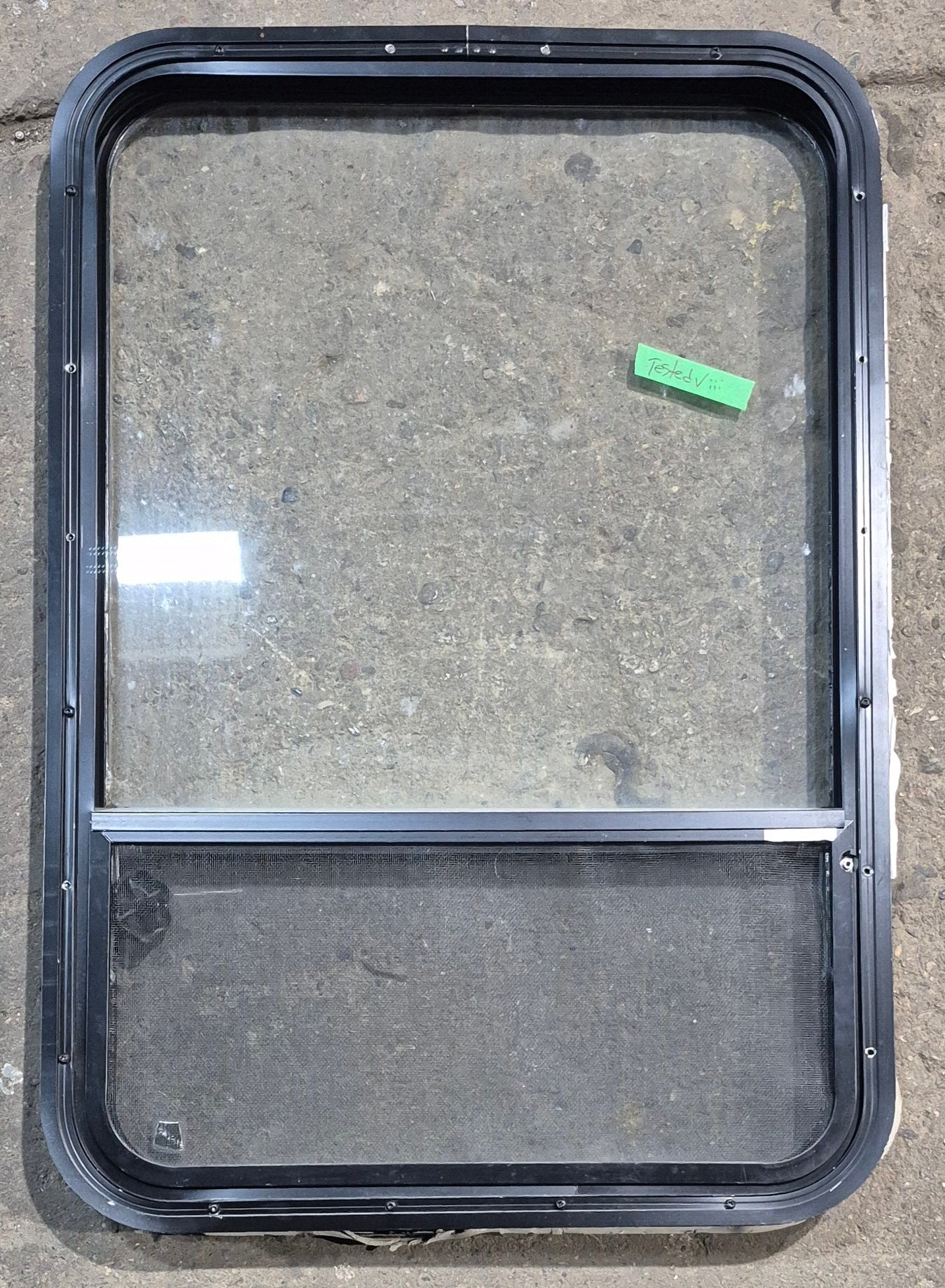 Used Black Radius Opening Window : 23 1/4" W x 34 1/2" H x 1 3/4" D - Young Farts RV Parts