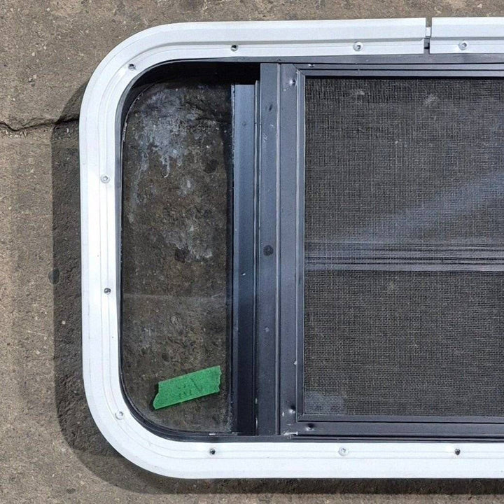 Used Black Radius Opening Window - 23 1/8" X 14 1/2" X 1 7/8" - Young Farts RV Parts