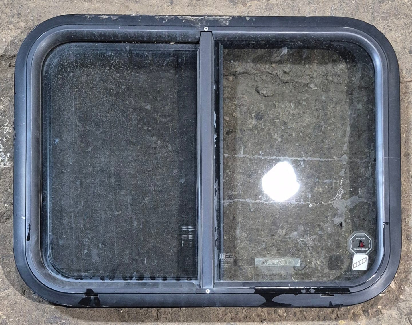 Used Black Radius Opening Window : 23 3/4" W x 17 3/4" H x 1 7/8" - Young Farts RV Parts