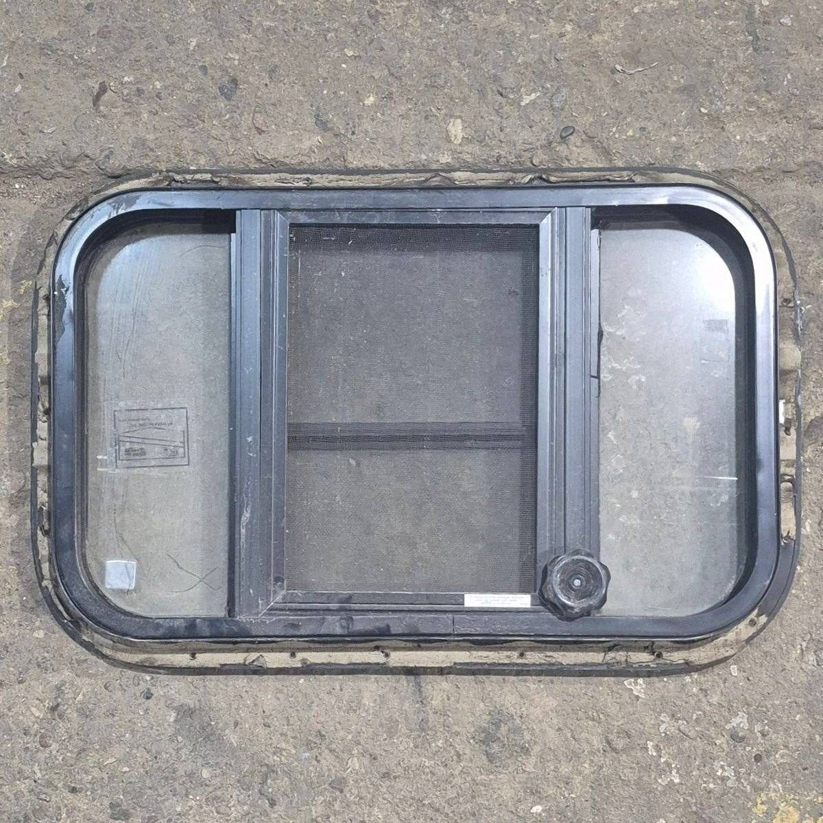 Used Black Radius Opening Window : 23 3/4" X 15" X 1 1/2 - Young Farts RV Parts