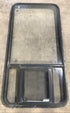Used Black Radius Opening Window : 23" W x 47 1/2" H x 1 7/8" D - Young Farts RV Parts