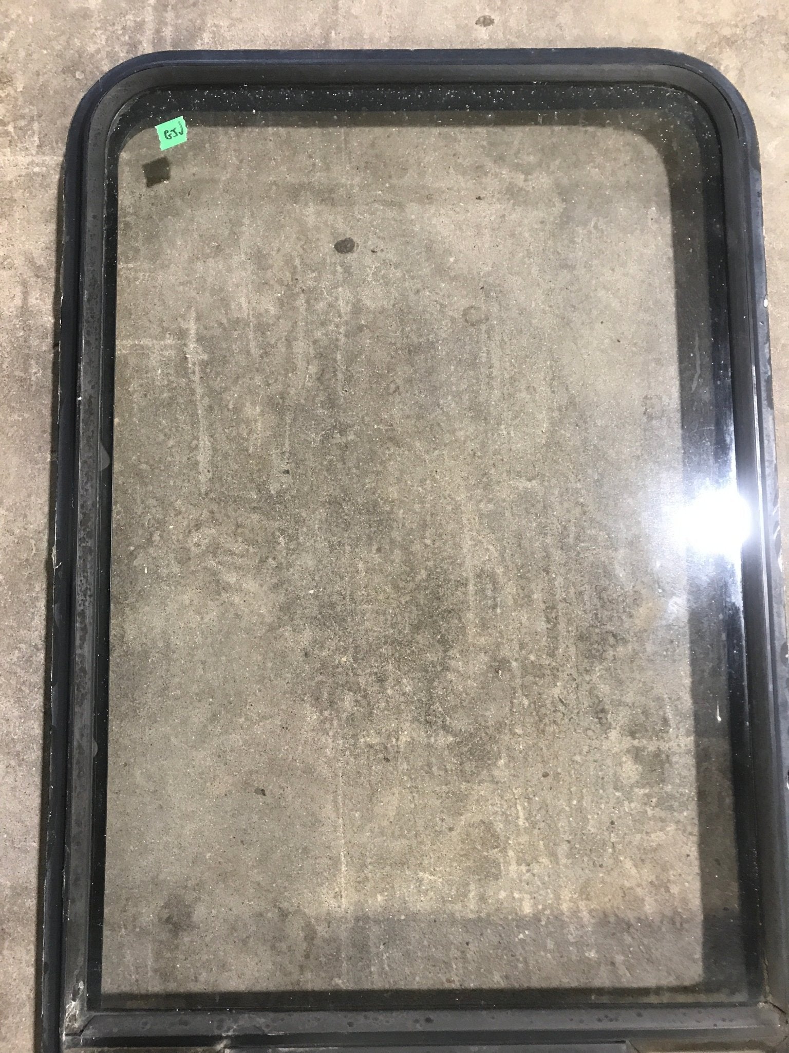Used Black Radius Opening Window : 23" W x 47 1/2" H x 1 7/8" D - Young Farts RV Parts