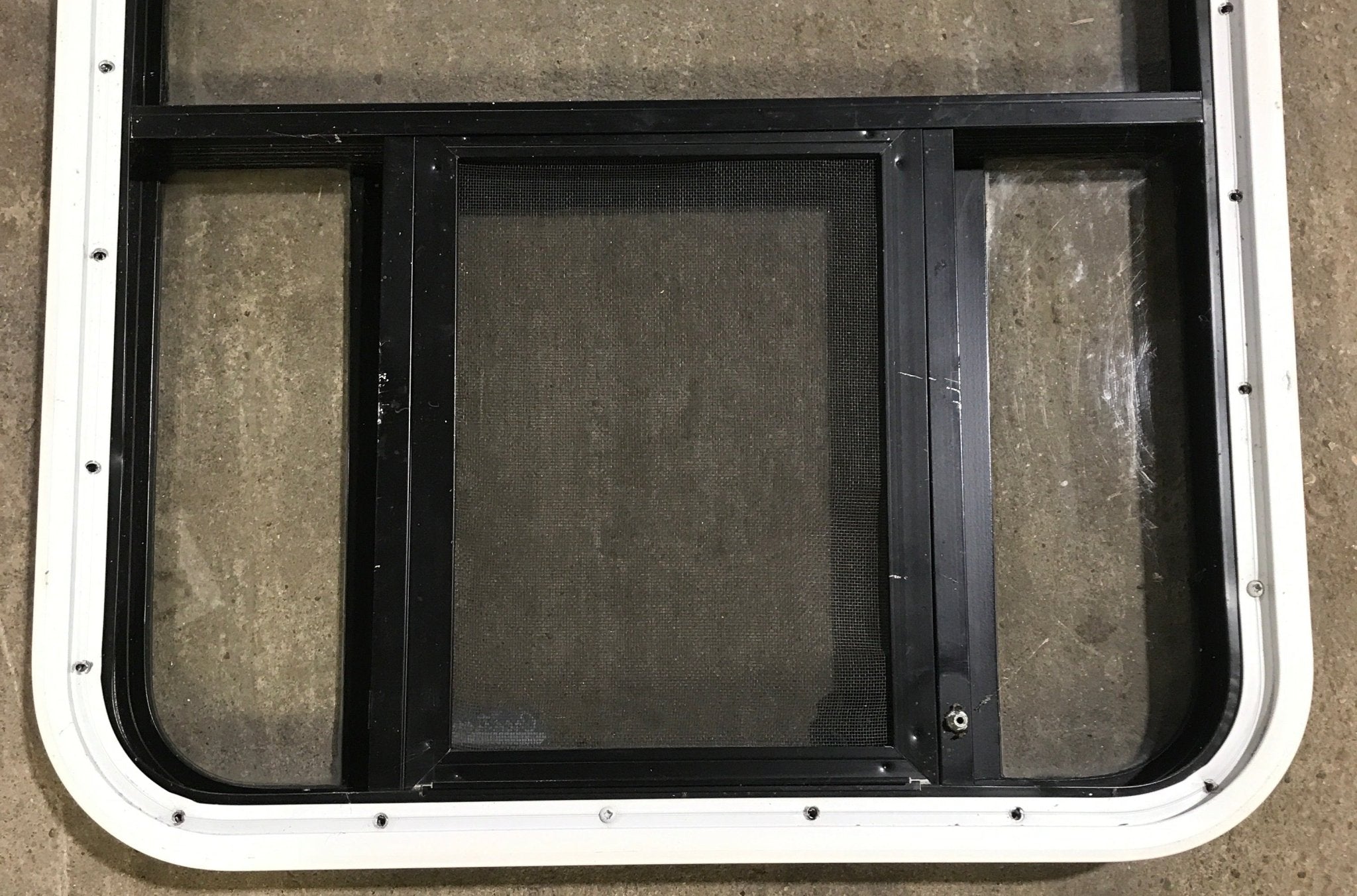 Used Black Radius Opening Window : 23" W x 47 1/2" H x 1 7/8" D - Young Farts RV Parts