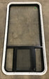 Used Black Radius Opening Window : 23" W x 47 1/2" H x 1 7/8" D - Young Farts RV Parts