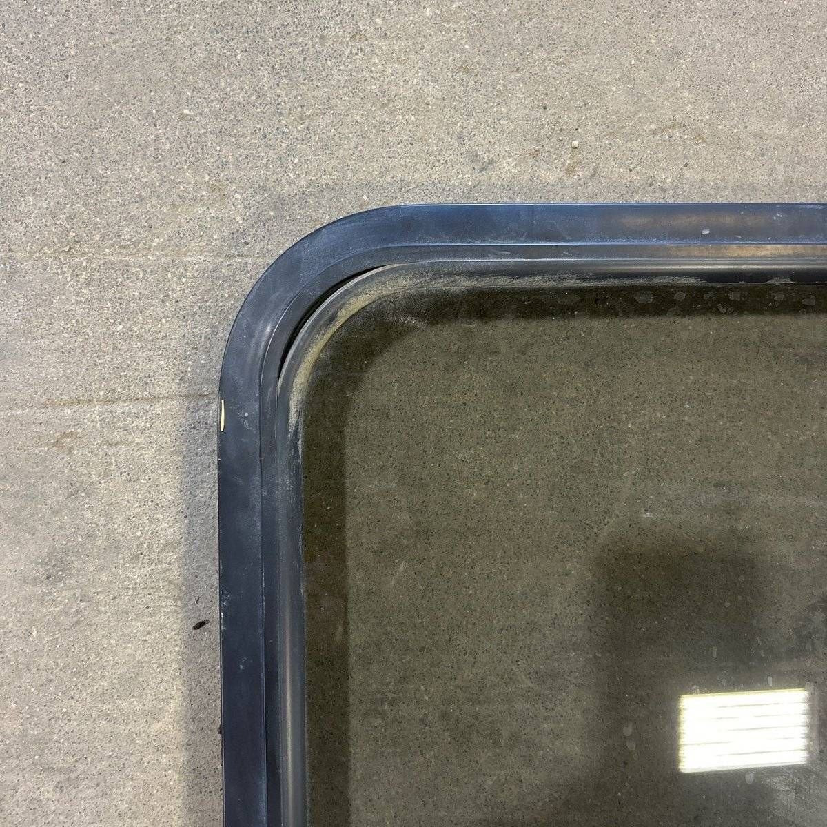 Used Black Radius Opening Window - 23.25 X 34.5 X 1.875 - Young Farts RV Parts