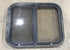 Used Black Radius Opening Window : 24 1/2" W x 19 1/4" H x 1 1/4" - Young Farts RV Parts