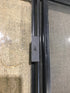 Used Black Radius Opening Window : 24 1/2" W x 19 1/4" H x 1 1/4" - Young Farts RV Parts