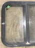 Used Black Radius Opening Window : 24 1/2" W x 21 1/2" H x 1 7/8" D - Young Farts RV Parts