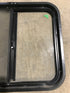 Used Black Radius Opening Window : 24 1/2" W x 21 1/2" H x 1 7/8" D - Young Farts RV Parts