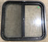 Used Black Radius Opening Window : 24 1/2" W x 21 1/2" H x 1 7/8" D - Young Farts RV Parts