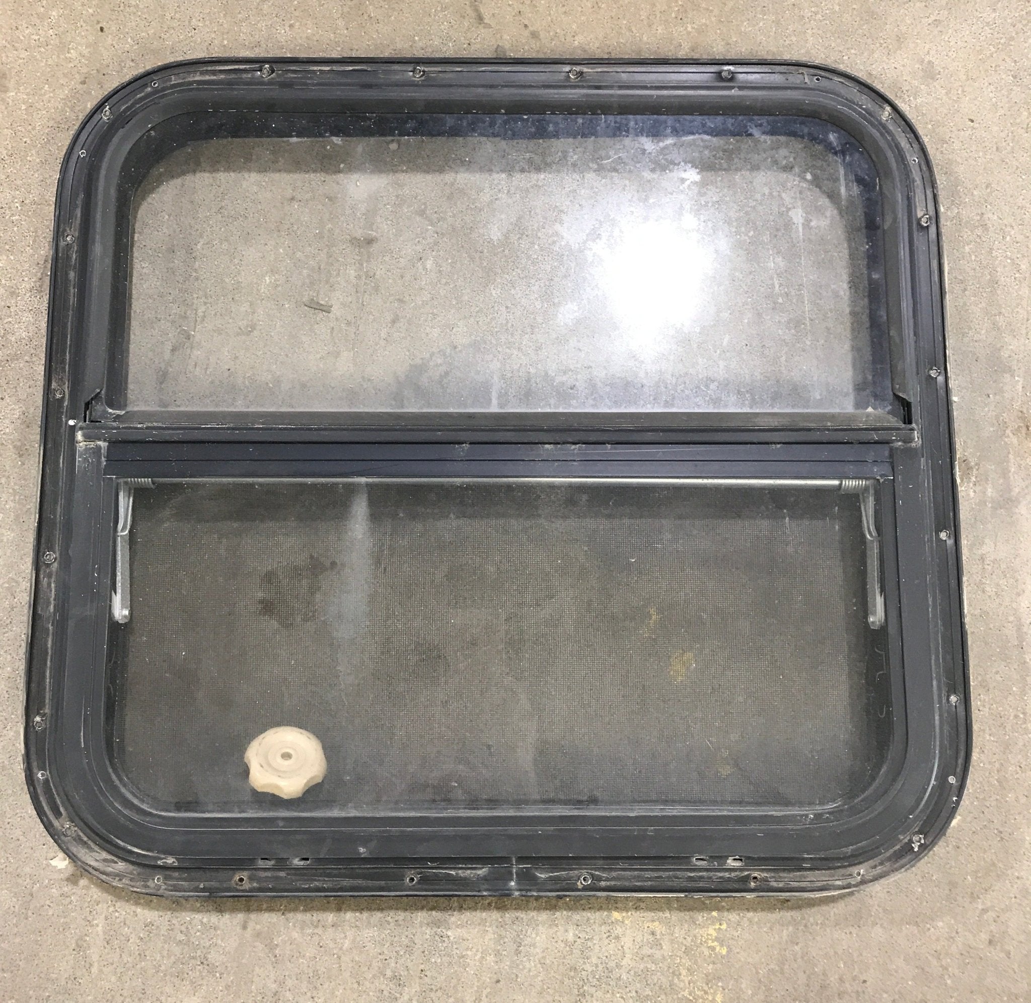 Used Black Radius Opening Window : 24 1/2" W x 22 1/2" H x 2" D - Young Farts RV Parts