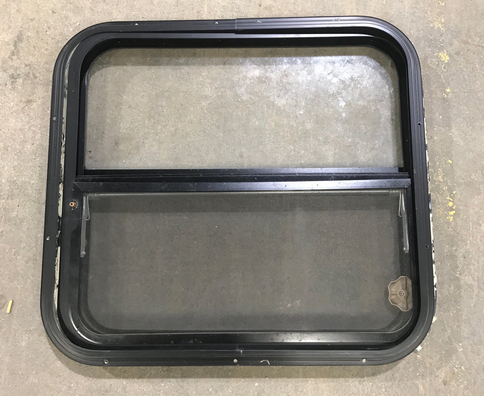 Used Black Radius Opening Window : 24 1/2" W x 22 1/2" H x 2" D - Young Farts RV Parts