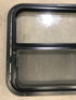 Used Black Radius Opening Window : 24 1/2" W x 22 1/2" H x 2" D - Young Farts RV Parts