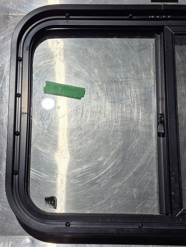 Used Black Radius Opening Window : 24 1/4" W x 17 3/4" H x 1 3/4" - Young Farts RV Parts