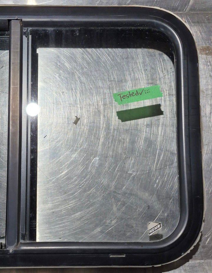 Used Black Radius Opening Window : 24 1/4" W x 17 3/4" H x 1 3/4" - Young Farts RV Parts