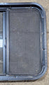 Used Black Radius Opening Window : 24 1/4" W x 21 3/4" H x 1 7/8" - Young Farts RV Parts