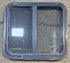Used Black Radius Opening Window : 24 1/4" W x 21 3/4" H x 1 7/8" - Young Farts RV Parts