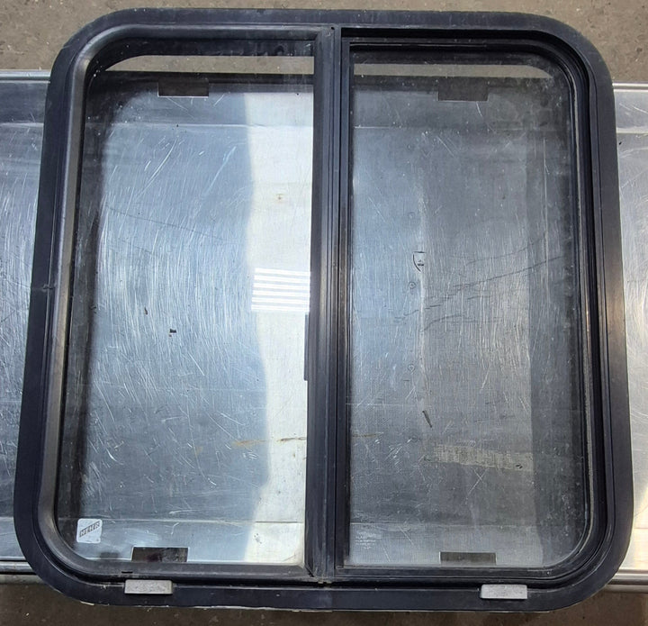 Used Black Radius Opening Window : 24 1/4" W x 25 3/4" H x 1 3/4" - Young Farts RV Parts