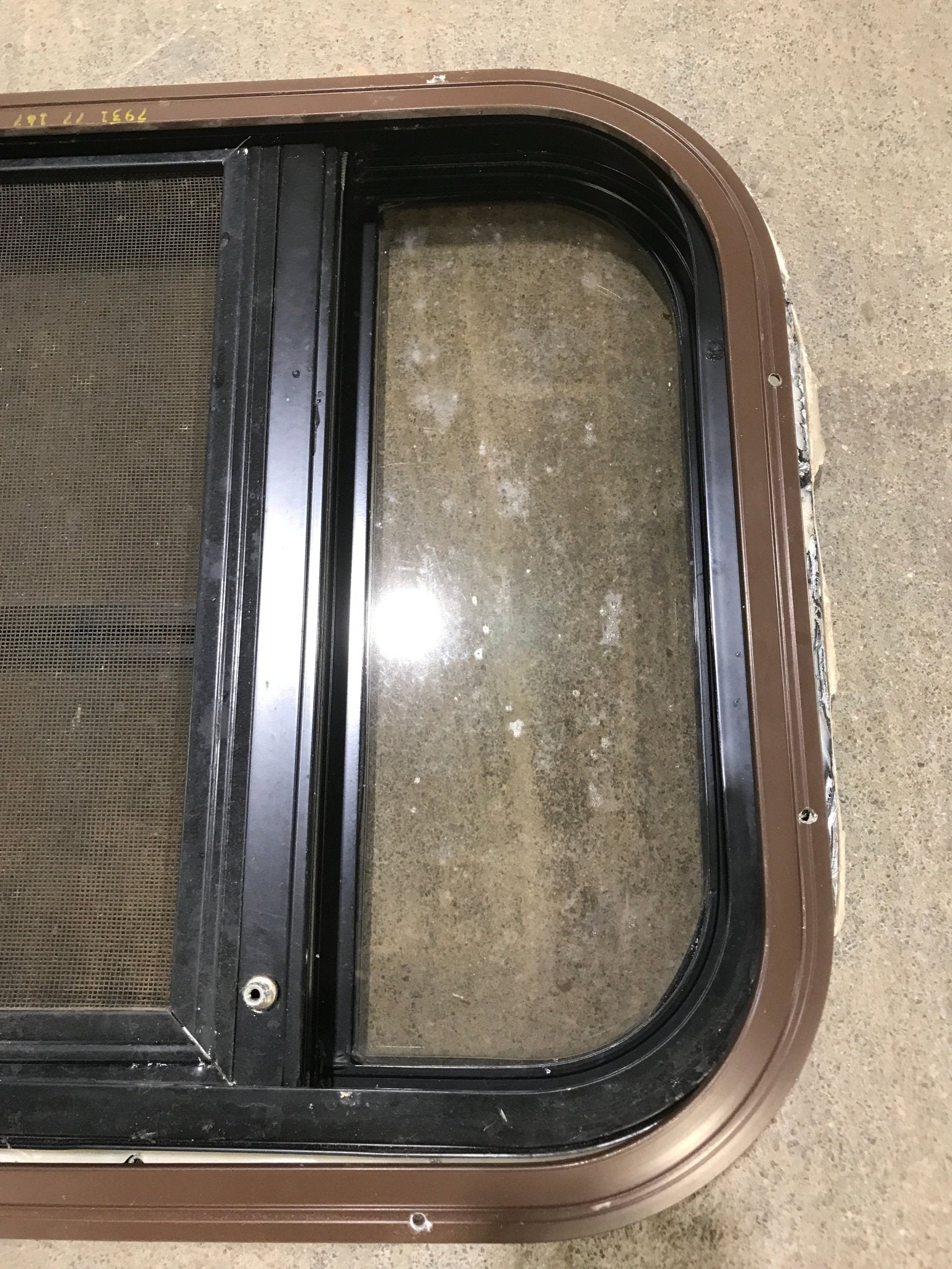 Used Black Radius Opening Window : 24 3/4" W x 15 3/4" H x 1 1/2" D - Young Farts RV Parts