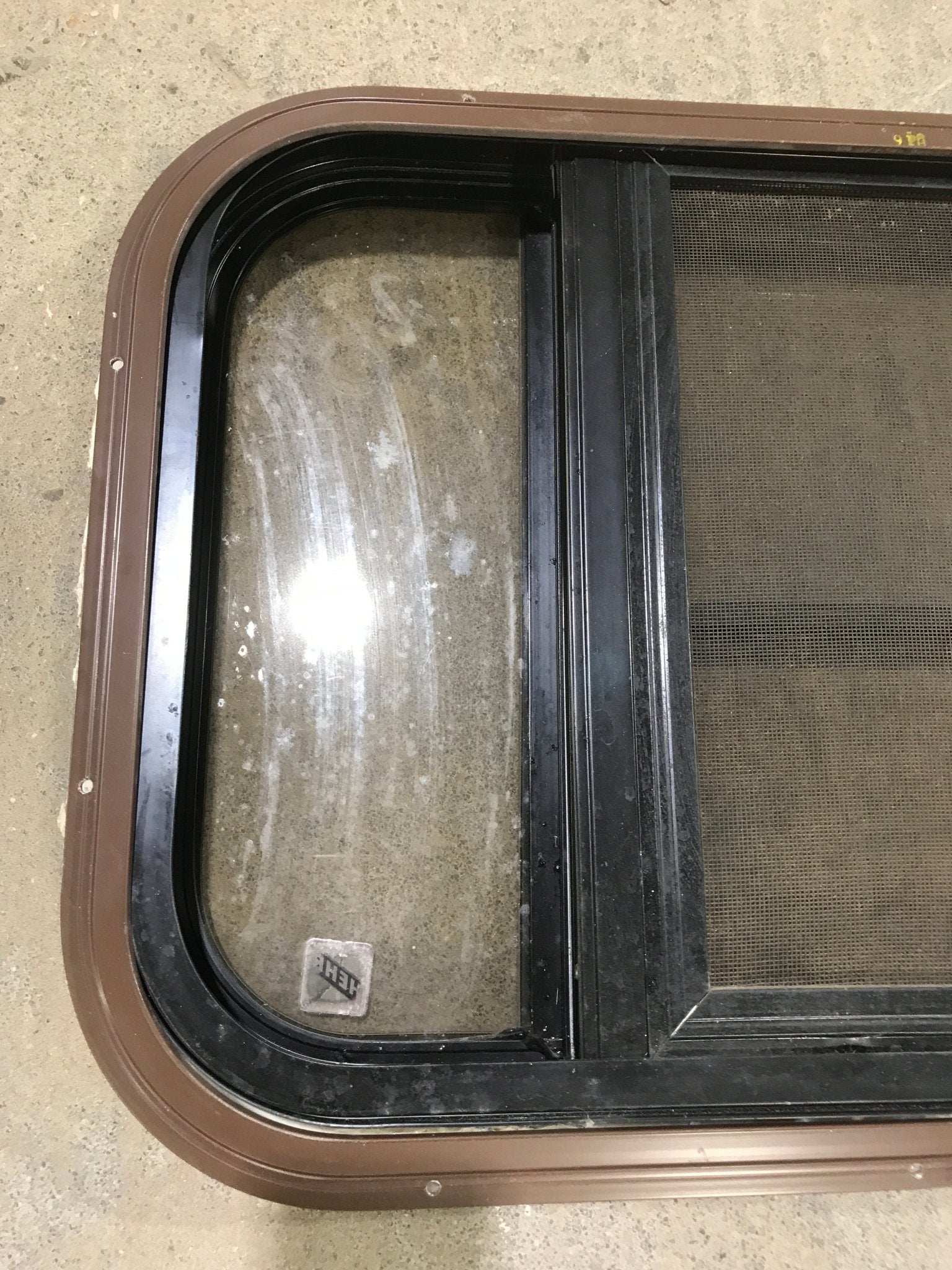 Used Black Radius Opening Window : 24 3/4" W x 15 3/4" H x 1 1/2" D - Young Farts RV Parts