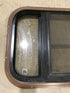 Used Black Radius Opening Window : 24 3/4" W x 15 3/4" H x 1 1/2" D - Young Farts RV Parts