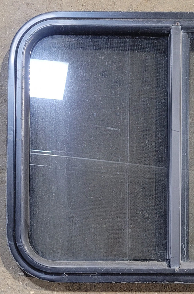 Used Black Radius Opening Window : 25 1/2" W x 20" H x 1 3/4" - Young Farts RV Parts